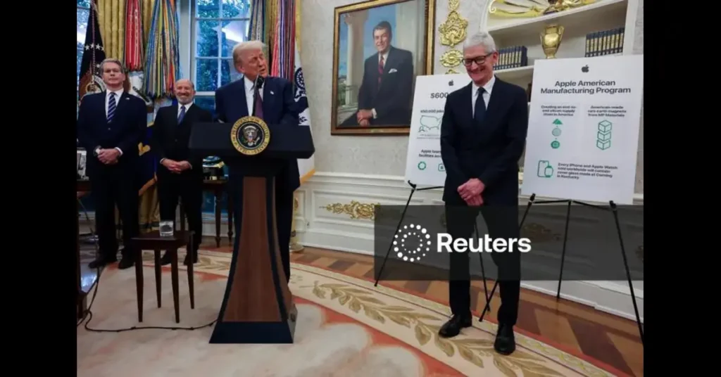 Apple CEO Tim Cook listens as former President Donald Trump announces a $100 billion investment in U.S. manufacturing, during a press event in the Oval Office, August 6, 2025.