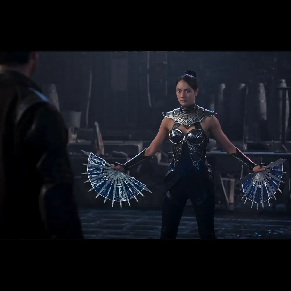Kitana prepares for battle in Mortal Kombat II trailer, showcasing a fierce pose and cinematic lighting from the 2025 film sequel.