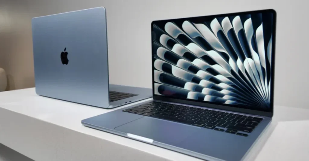 Blue MacBooks on white table