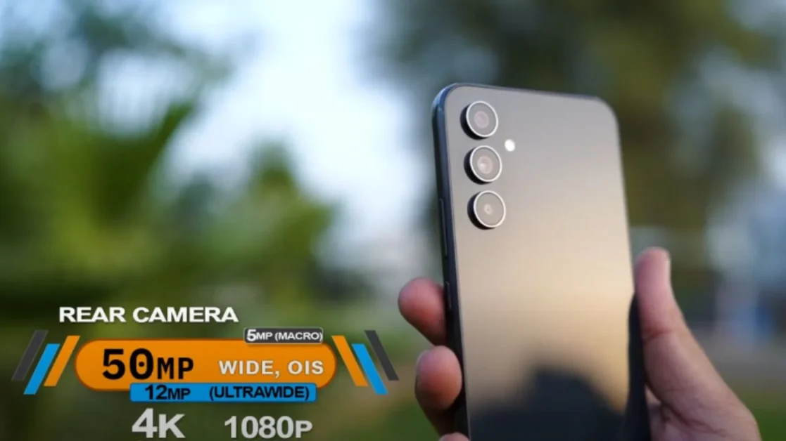Close-up of Samsung Galaxy A54 5G showing triple rear camera setup with 50MP wide, 12MP ultrawide, and 5MP macro lens.