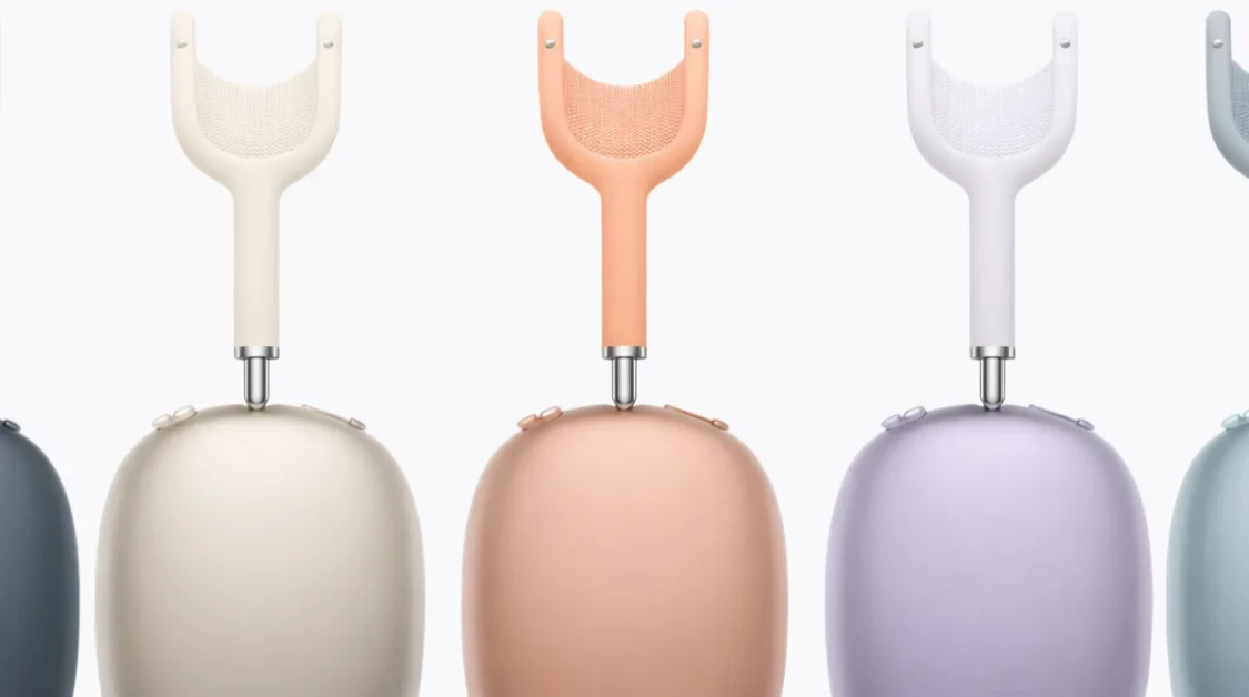 AirPod Max 2 color lineup showing multiple over-ear headphones in different pastel and dark finishes on a clean light background