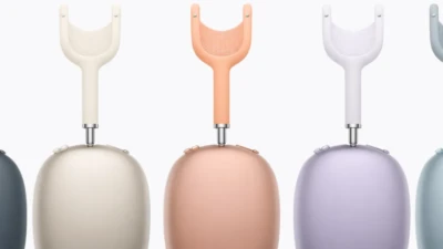 AirPod Max 2 color lineup showing multiple over-ear headphones in different pastel and dark finishes on a clean light background