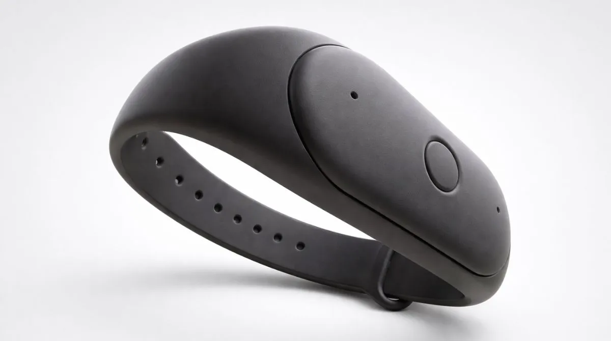 Close-up view of a sleek wearable AI band with matte finish on a light background, showing the full band design and button details