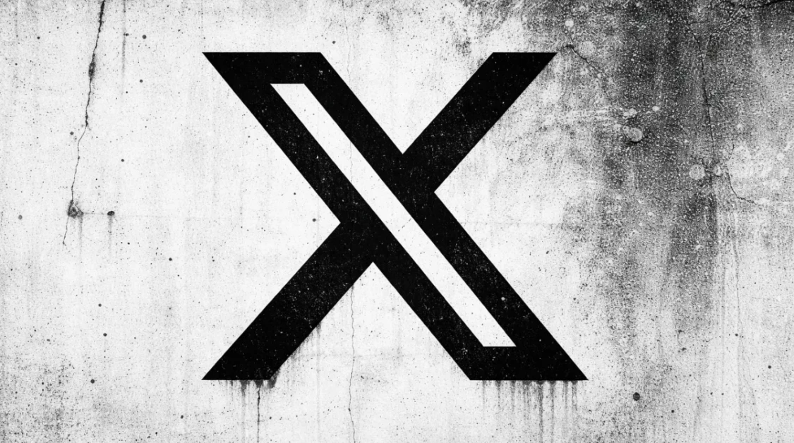 Bold black X symbol displayed on a weathered concrete wall with gritty texture and monochrome editorial styling.